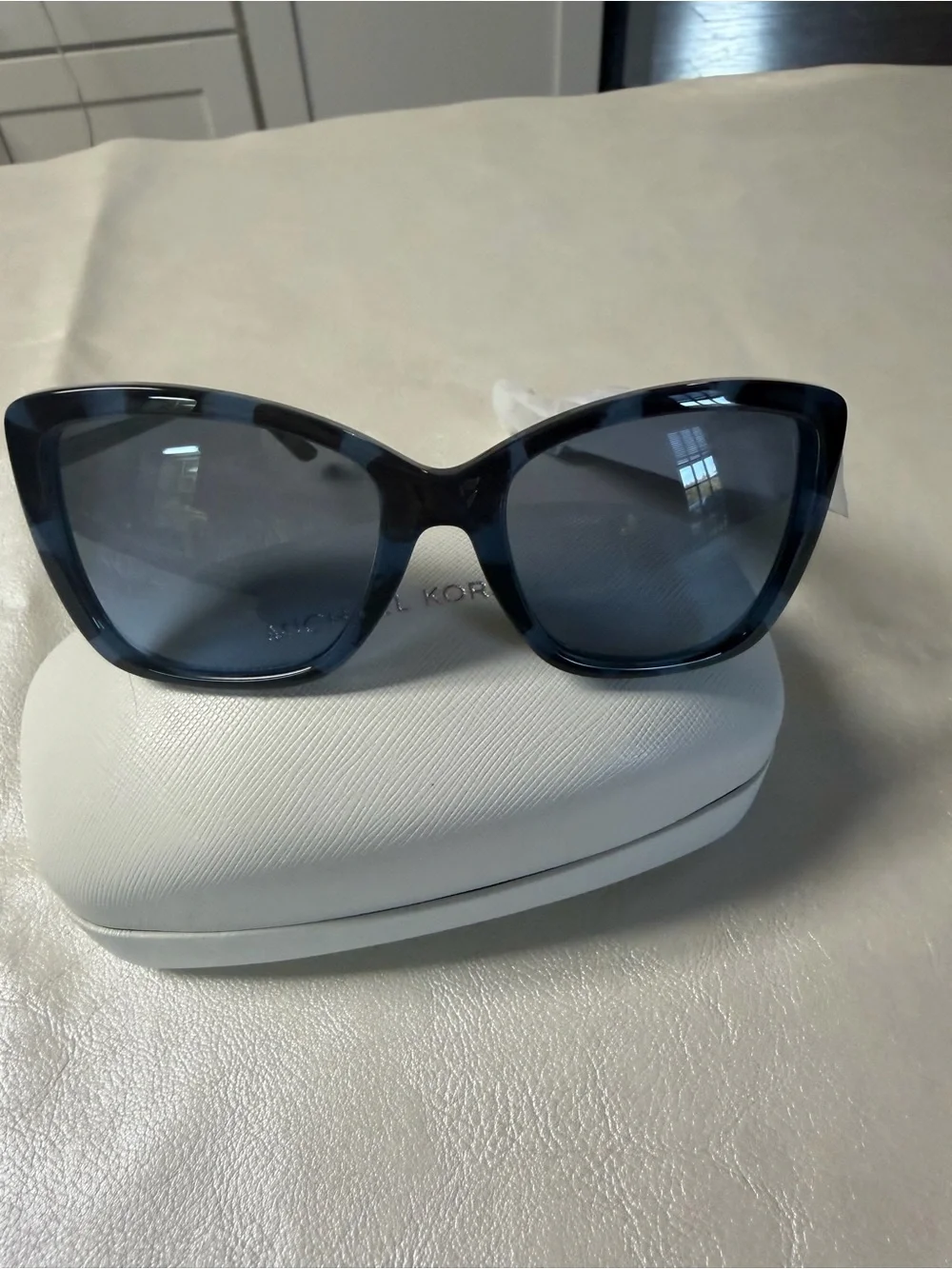 Michael Kors sophisticated cat